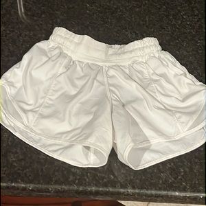 Women’s Lululemon size 0 shorts. White.  Worn once, stain free;